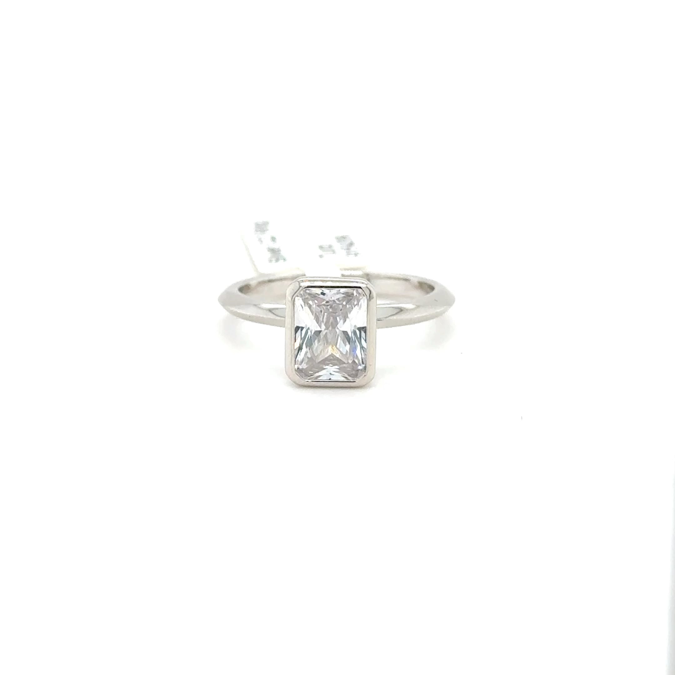 Sterling Silver Emerald Cut Bezel Set Ring with Cubic Zirconia