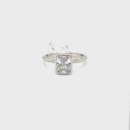 Sterling Silver Emerald Cut Bezel Set Ring with Cubic Zirconia