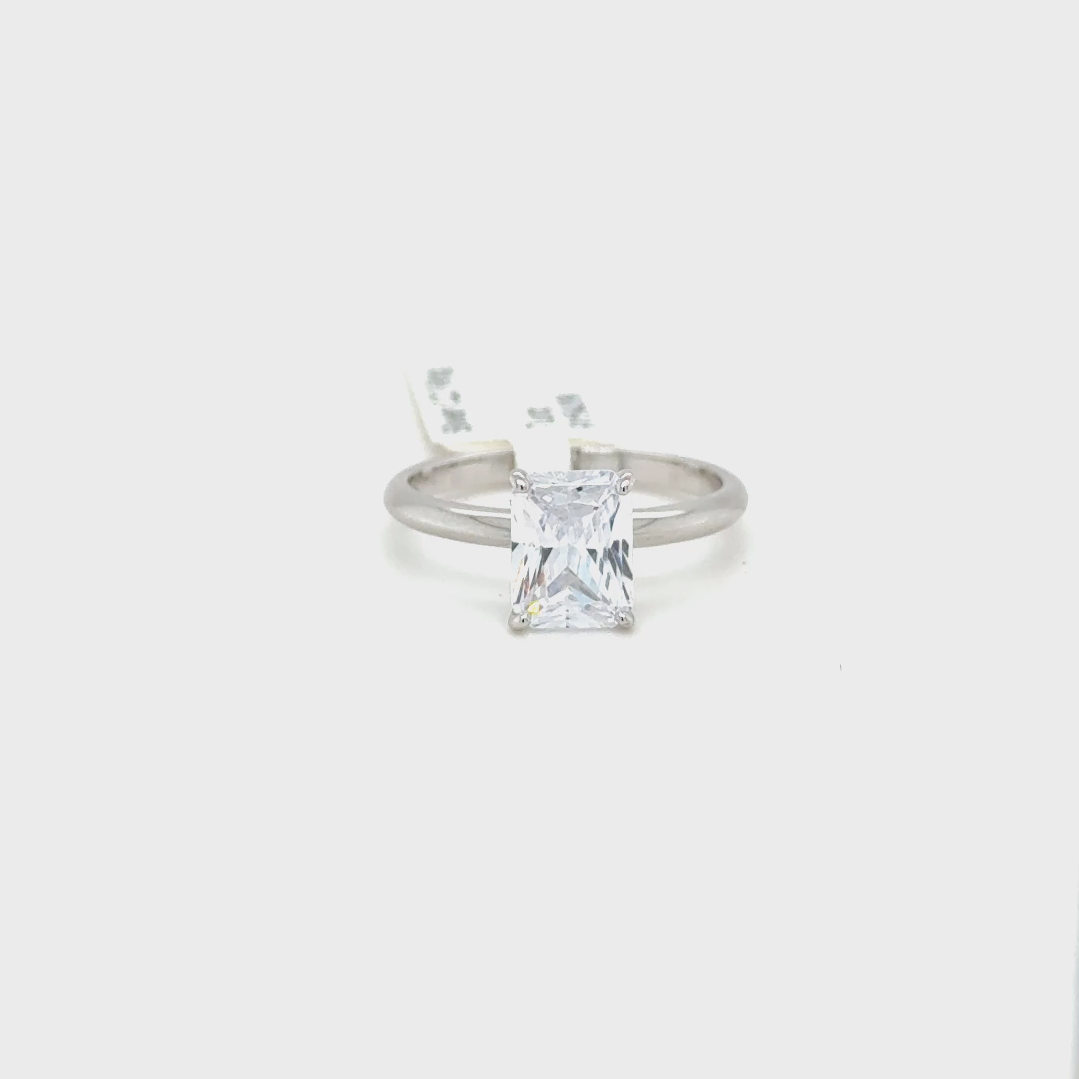 Sterling Silver Emerald Cut Solitaire Ring with Cubic Zirconia